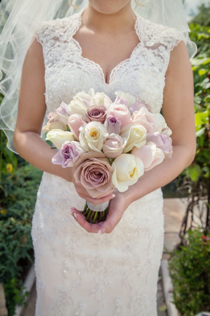 blush pink roses ivory roses hand tied  head to head