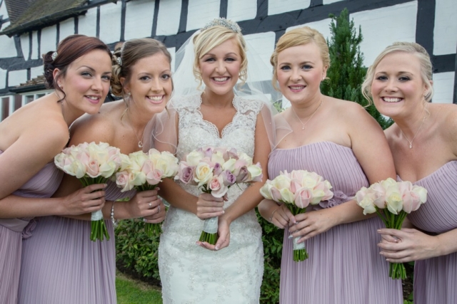 Bridal party flowers lilacs ivory & chocolate roses