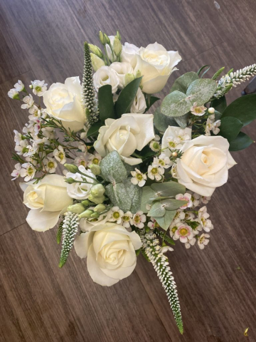 Simplistic bridal bouquet in whites & eucalyptus