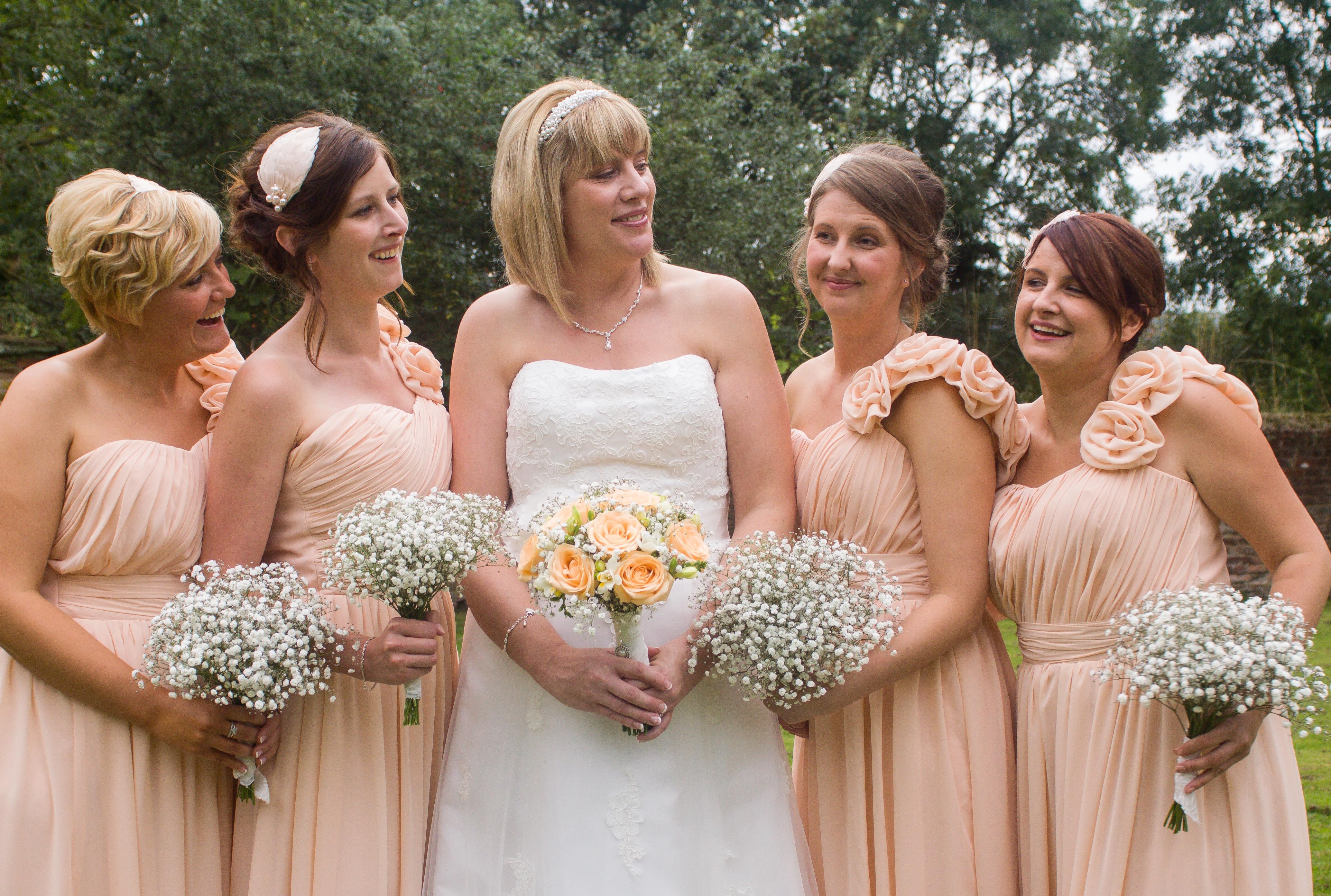 gypsophila and roses bridal bouquet and bridesmaids flowers
