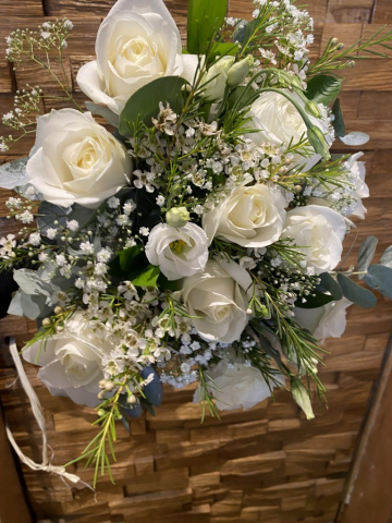 wild looking hand tied bouquet in whites