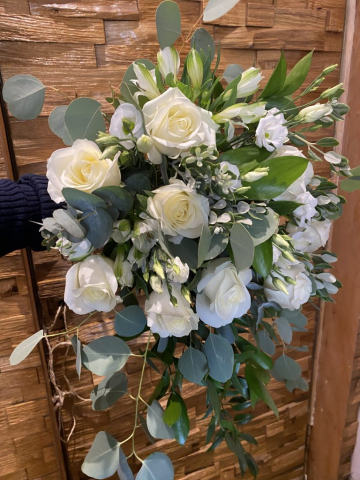 Front facing Ivory roses, alstro, lissianthus & gyp hand tied bridal bouquet