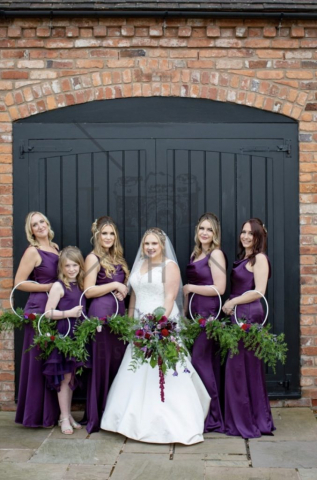 Bridesmaids hoops with burgundy  and lilac flowers