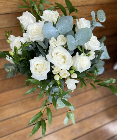 Ivory roses, freesia & eucalyptus bridal bouquet