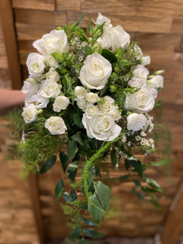 natural rustic wedding flowers trailing foliage ivory rose  lissianthus and green soft ruscuss eucalyptus hand tied bouquet