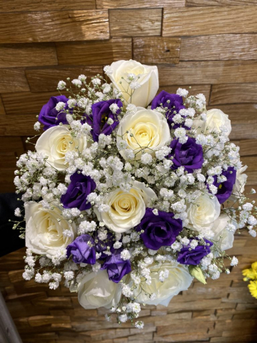 hand tied ivory roses with purple lissianthus Gypsophlia