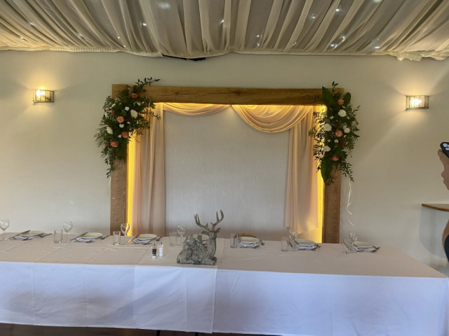 top table backdrop flowers