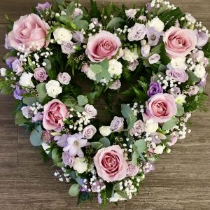 A pretty and delicate open heart can be in any colours of your choice. Same day delivery.