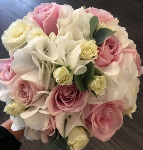 bridal bouquet of roses and ivory hydrangea eucalyptus