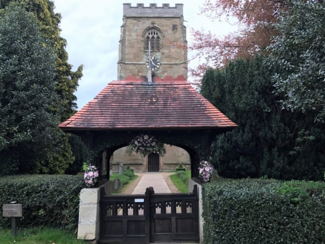 church gate entrance of flowers