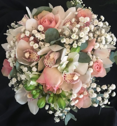 bridal bouquet of roses and ivory freesia  gypsophila eucalyptus