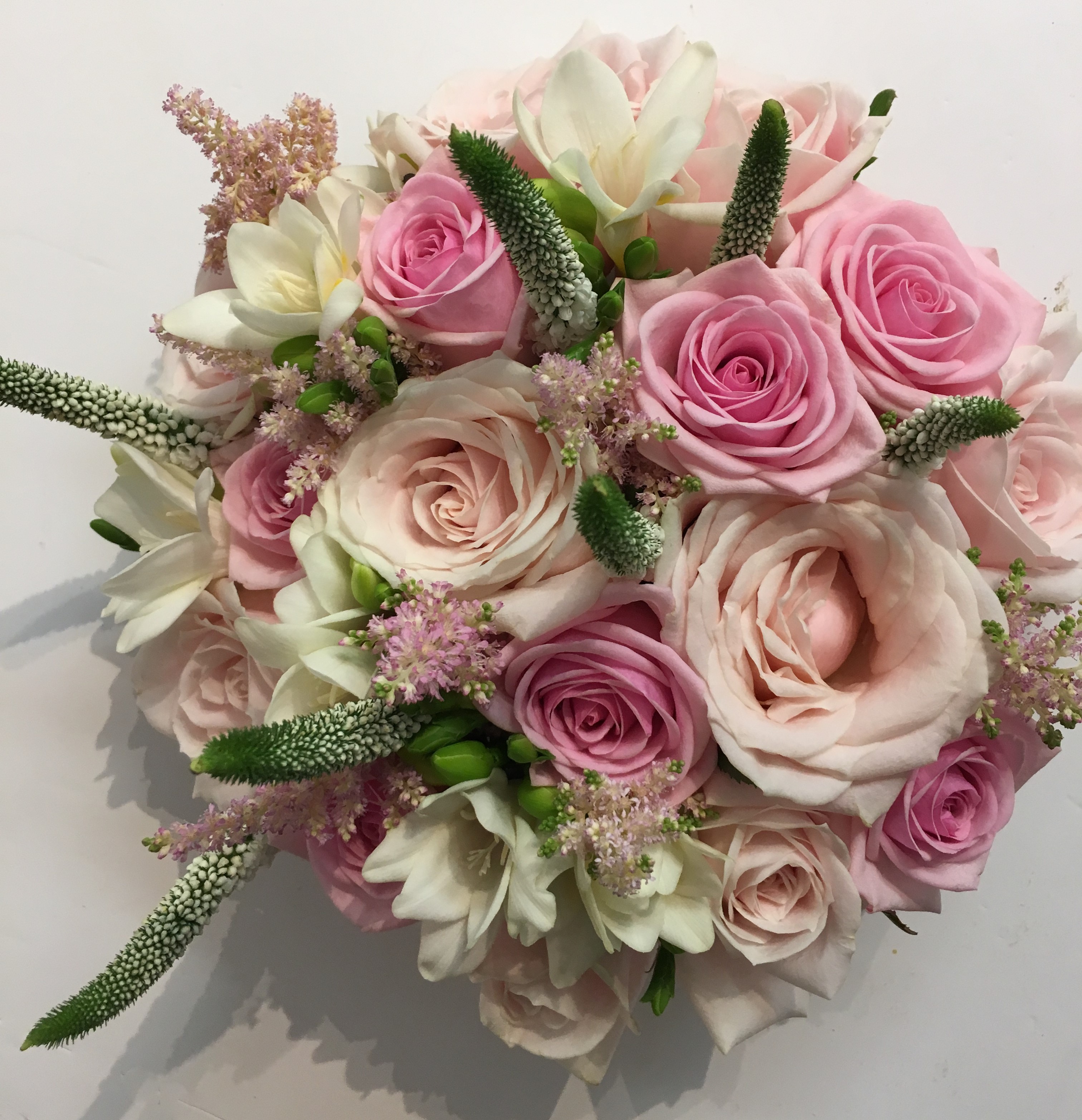 bridal bouquet of roses and ivory freesia veronica & astilbe wedding flowers in redditch