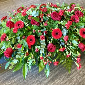 Casket Spray of mixed flowers any colours