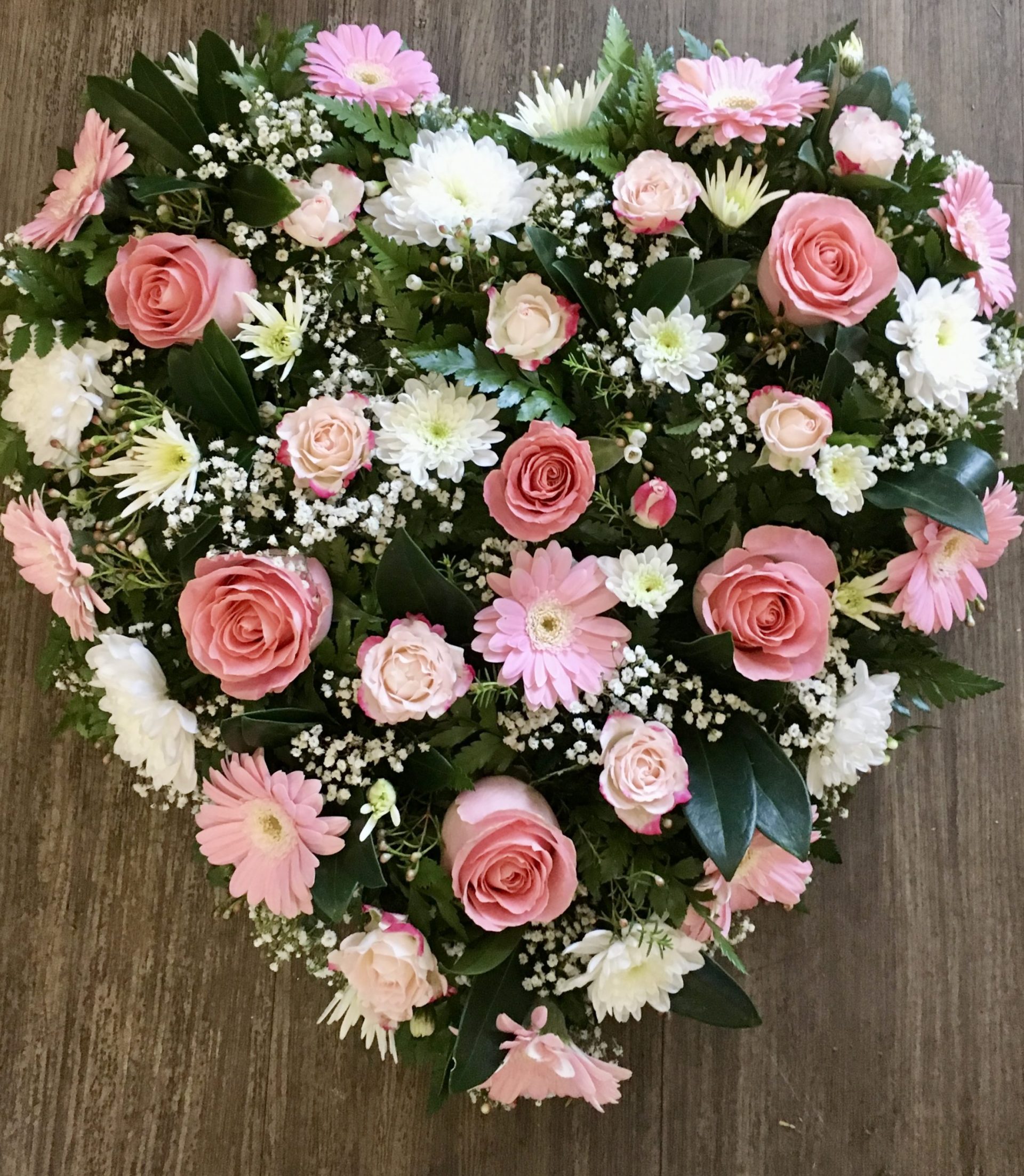 solid heart in bright colours funeral tribute heart can be in any colours of your choice. Same day delivery.