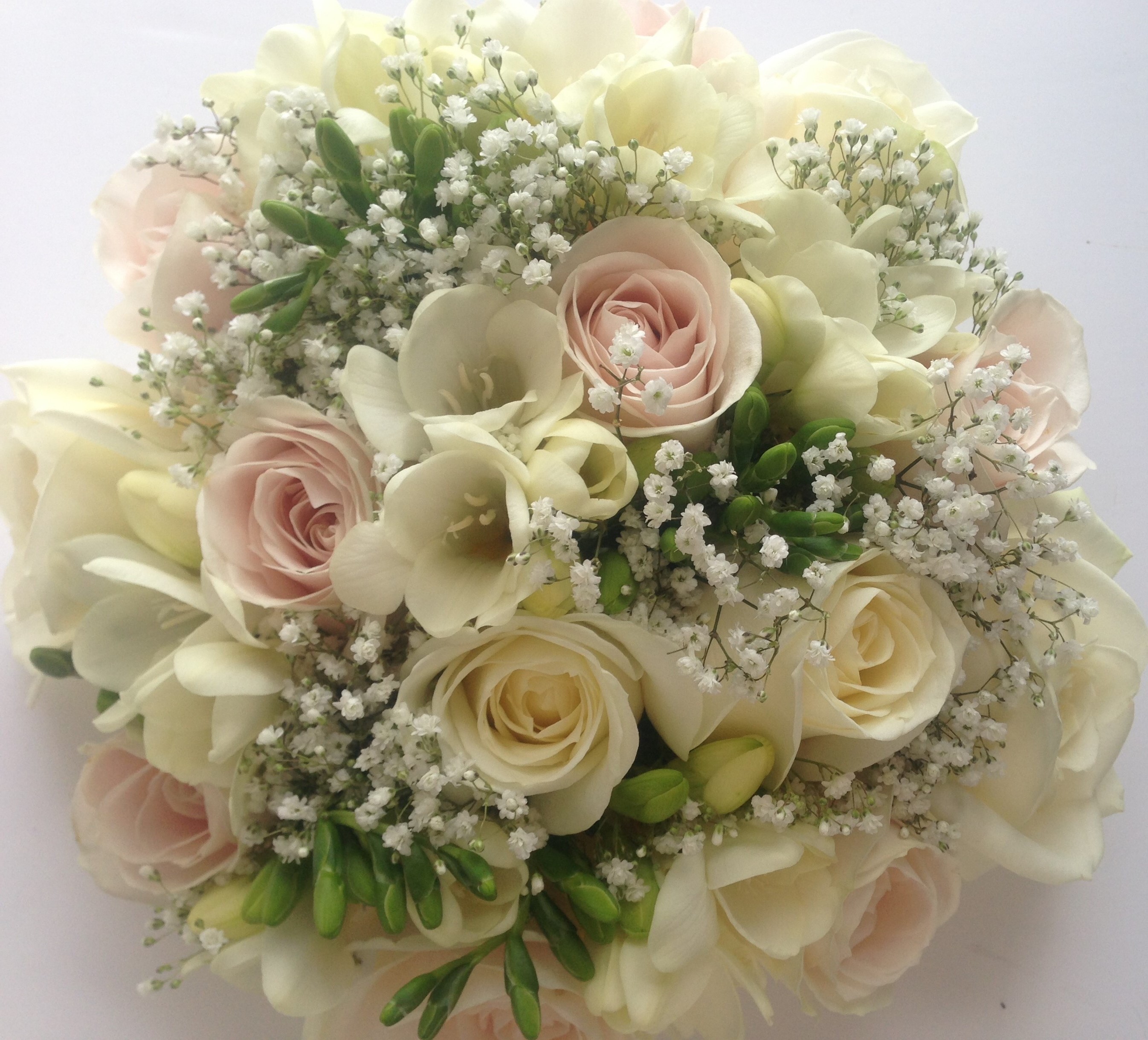 scented freesia & pink roses with gypsophila hand tied