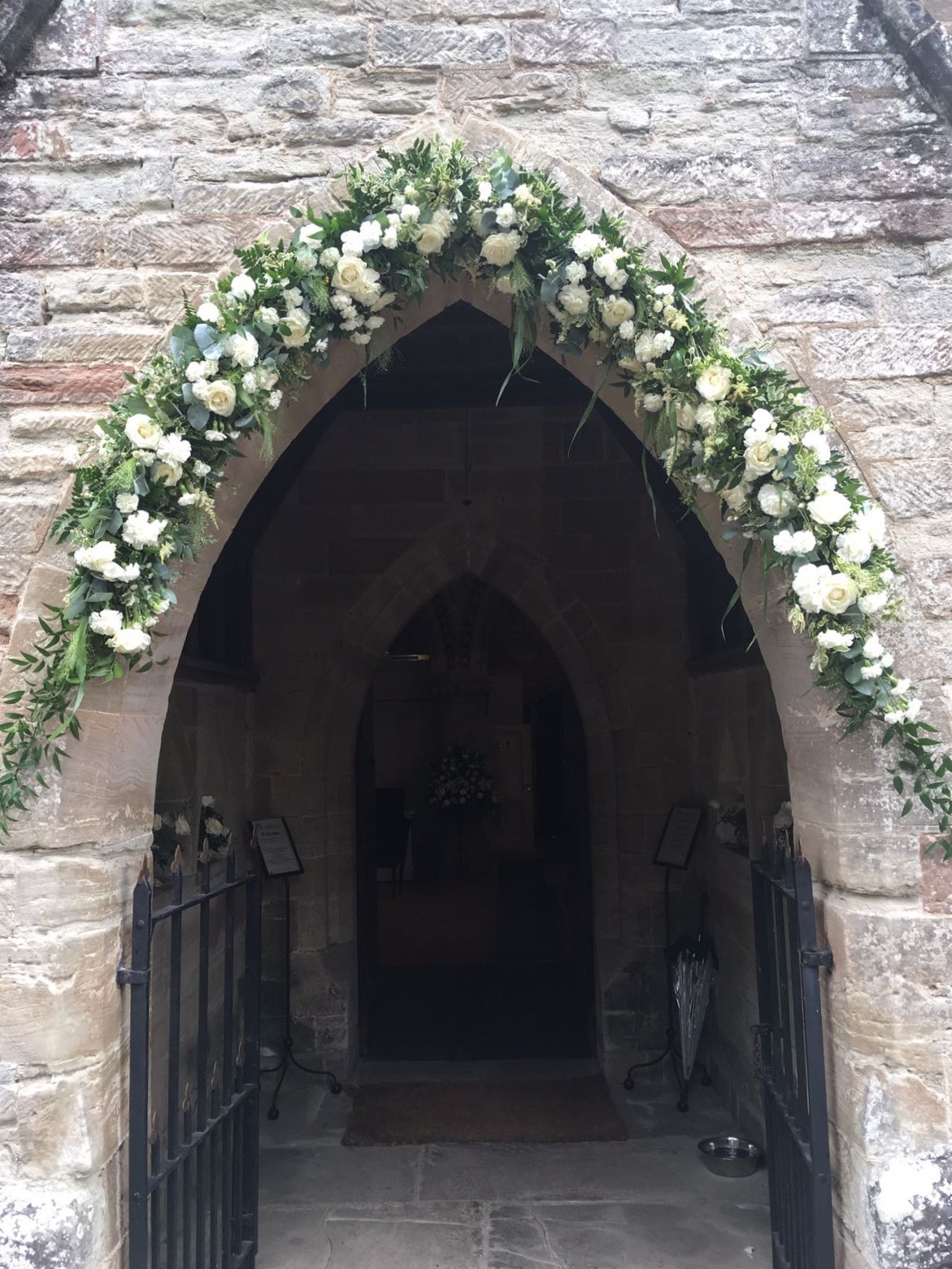 soft white flower church arch