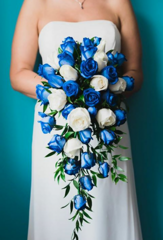 shower bouquet blue roses ivory roses soft ruscus