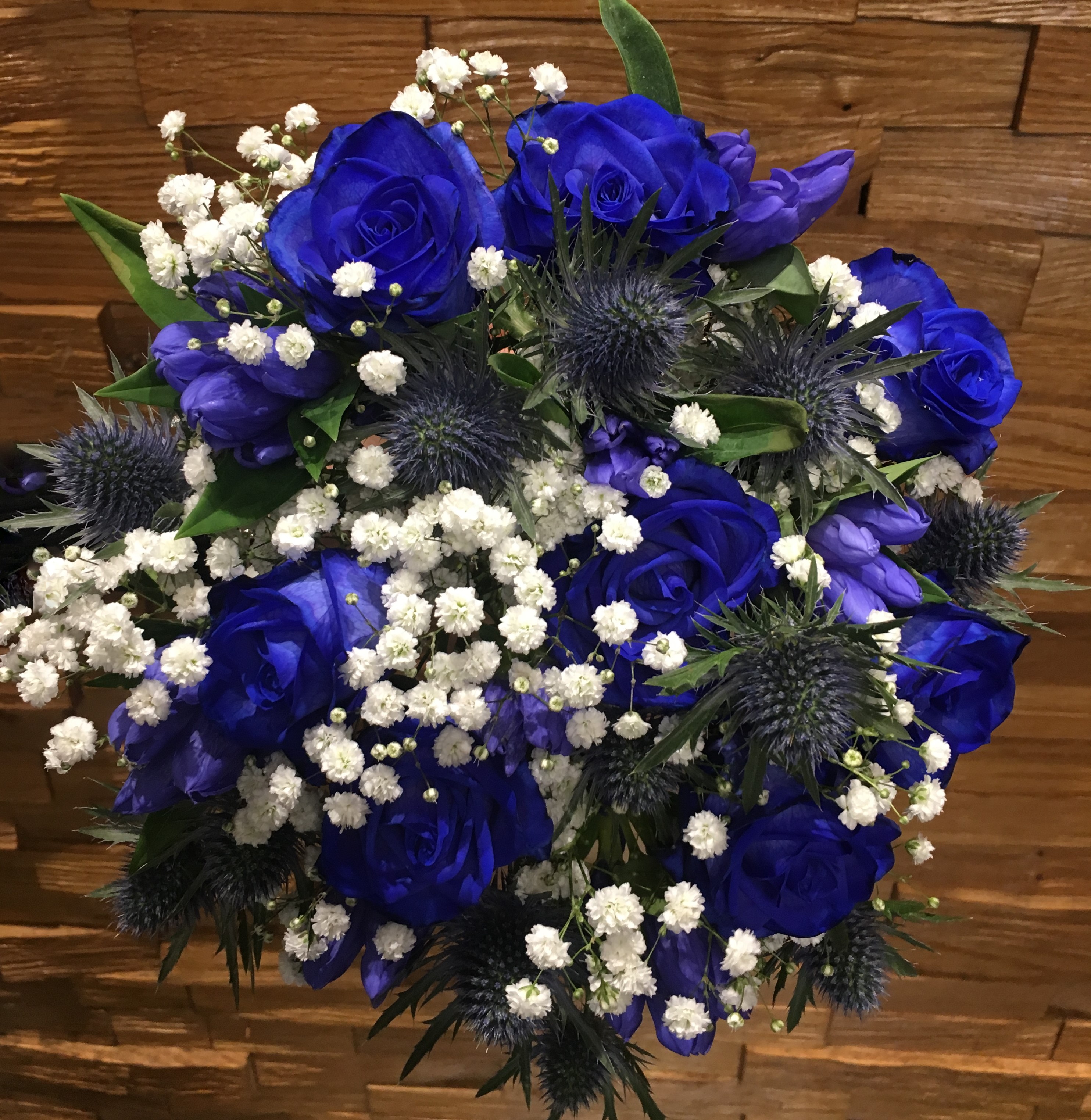 blue rose thistle gentini hand tied