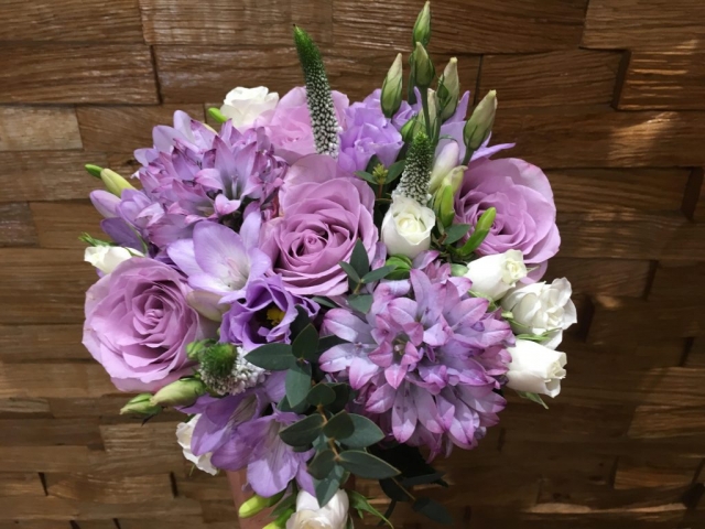 bridesmaid bouquet in lilac flowers