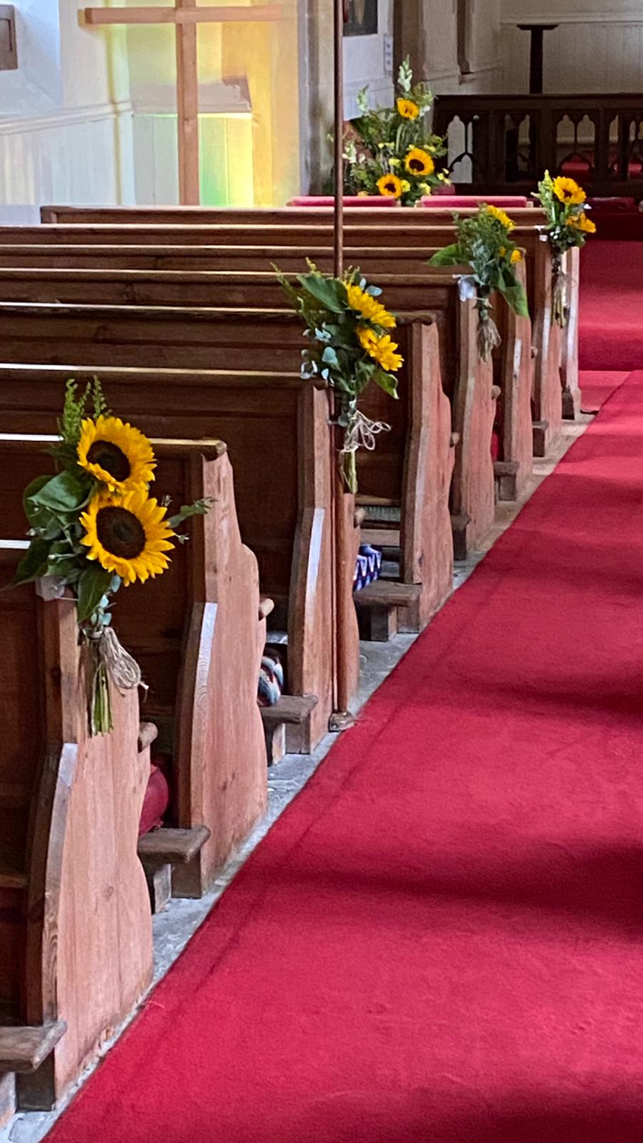 Sunflower pew ends