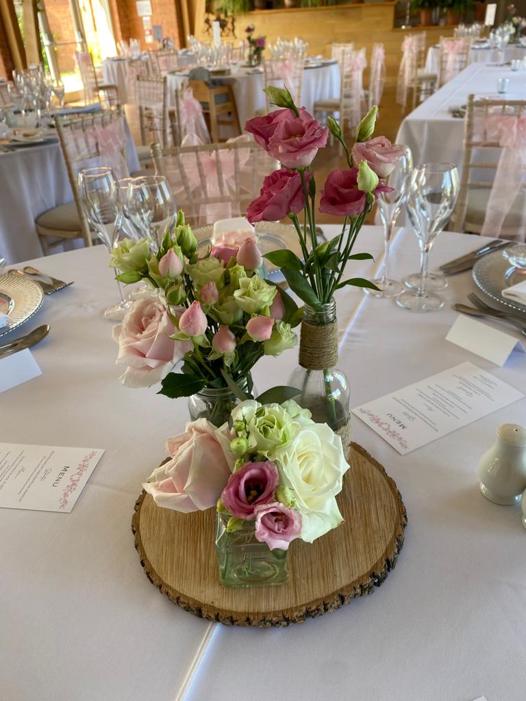 Log Table centrepiece with Jam jars in Ivory & pink