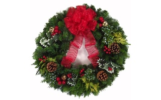 fresh holly wreath with bow