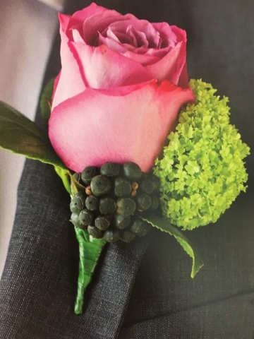 something different grooms buttonhole
