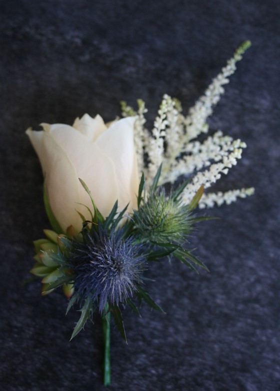 succulent thistle astilbe bridal party buttonholes