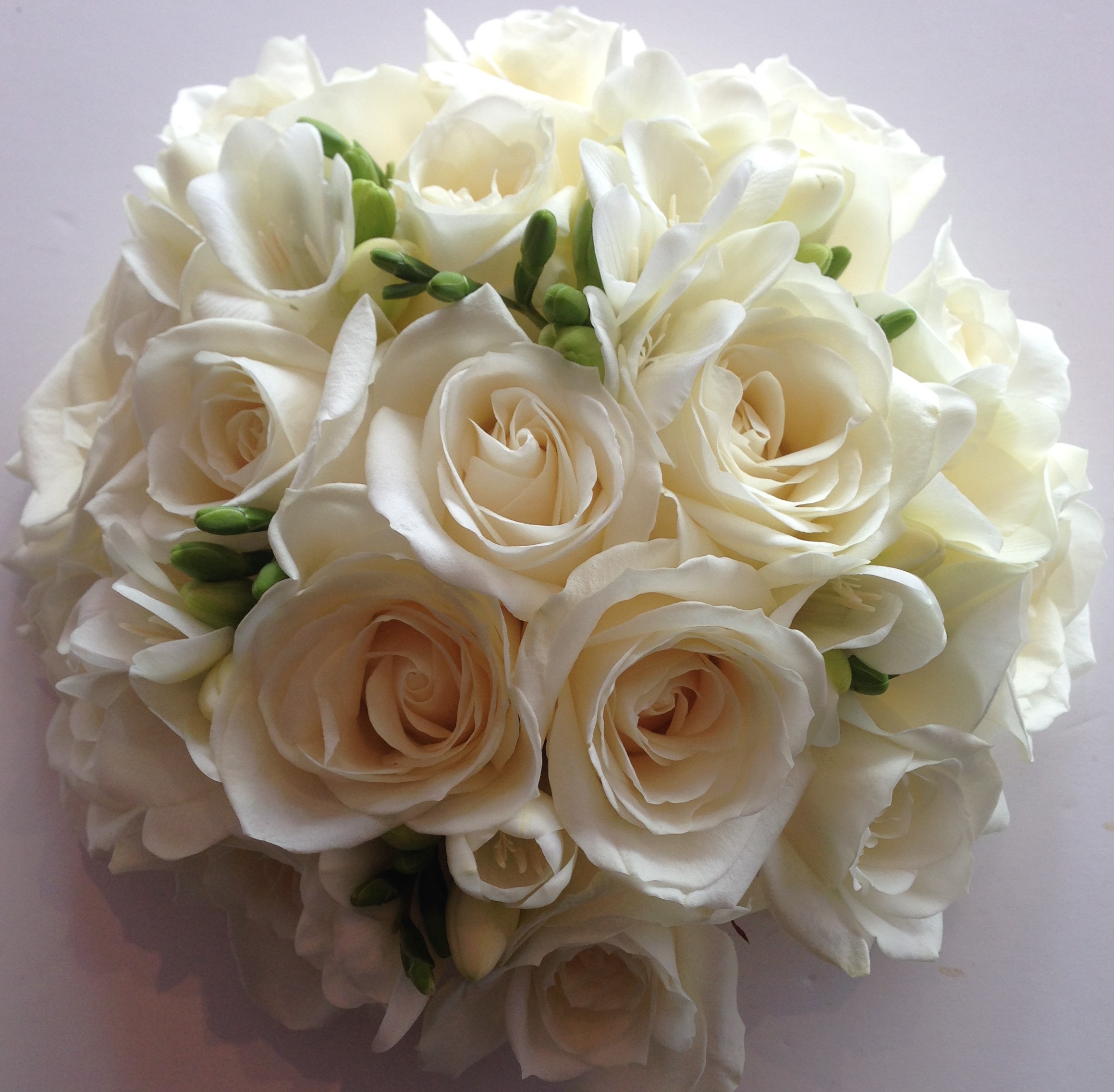 ivory roses and freesia scented flower bouquet