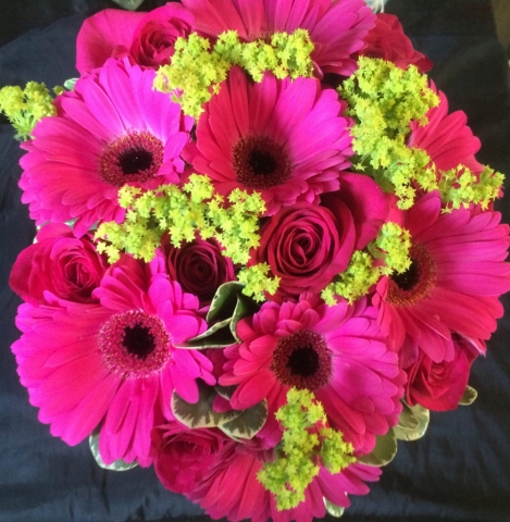 Hand tied vibrant wedding theme flowers in redditch