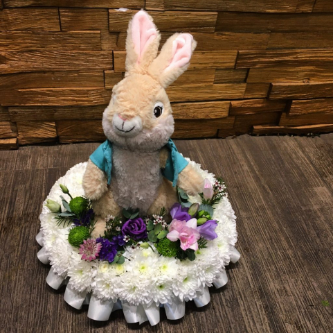 Peter Rabbit funeral tribute from fair with flowers
