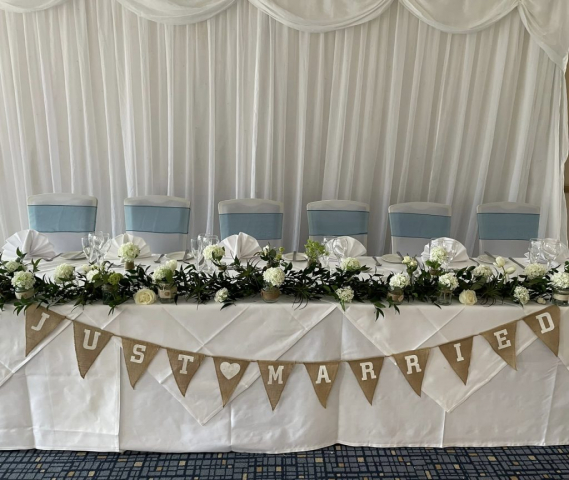 Starlight backdrop chair covers top table setting Ardencote Manor