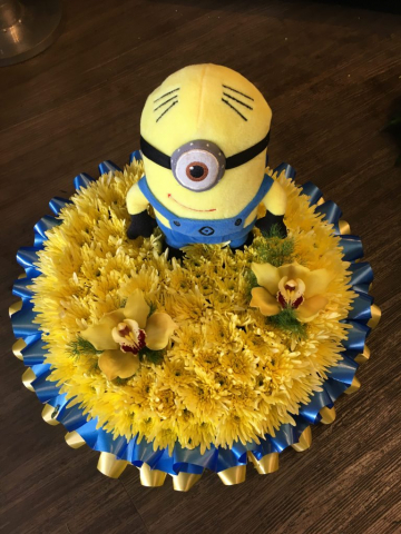 Minion bespoke funeral tribute from flair with flowers