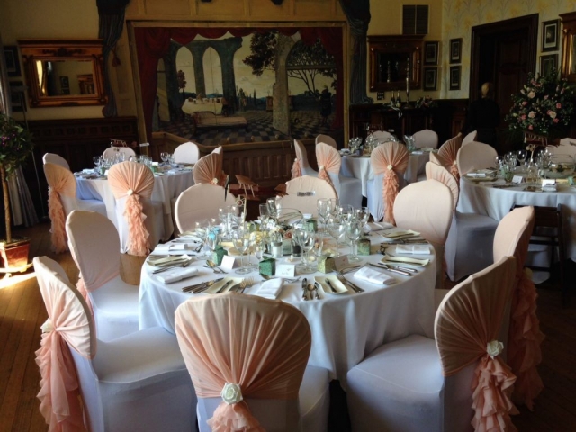 Chair covers with hoods and silk ivory rose detail