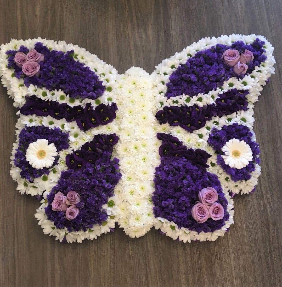 bespoke butterfly for a funeral tributes in fresh flowers