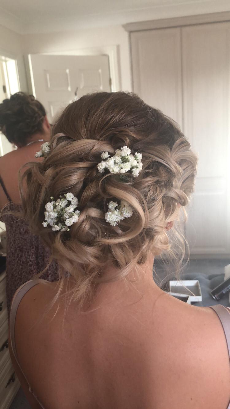 Simple bridesmaids hair flowers