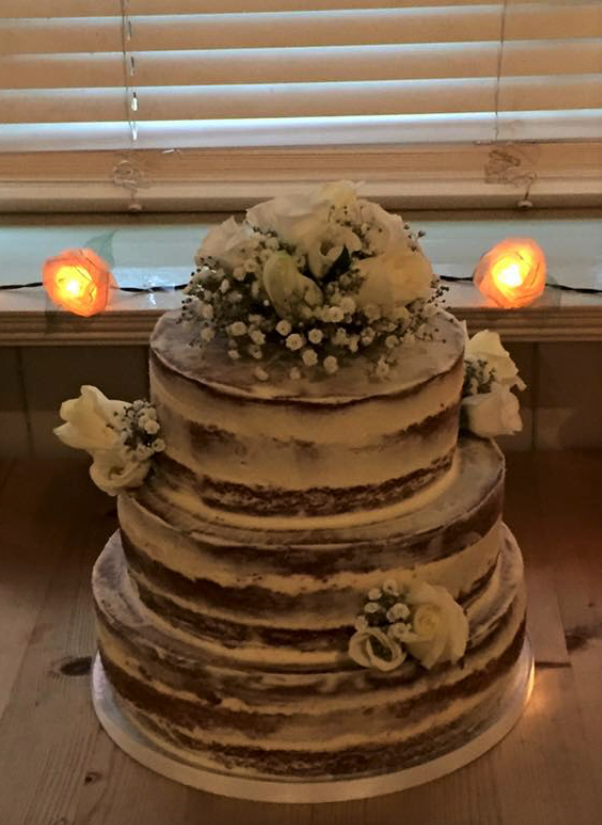 frosted naked cake with ivory flowers cake flowers 5