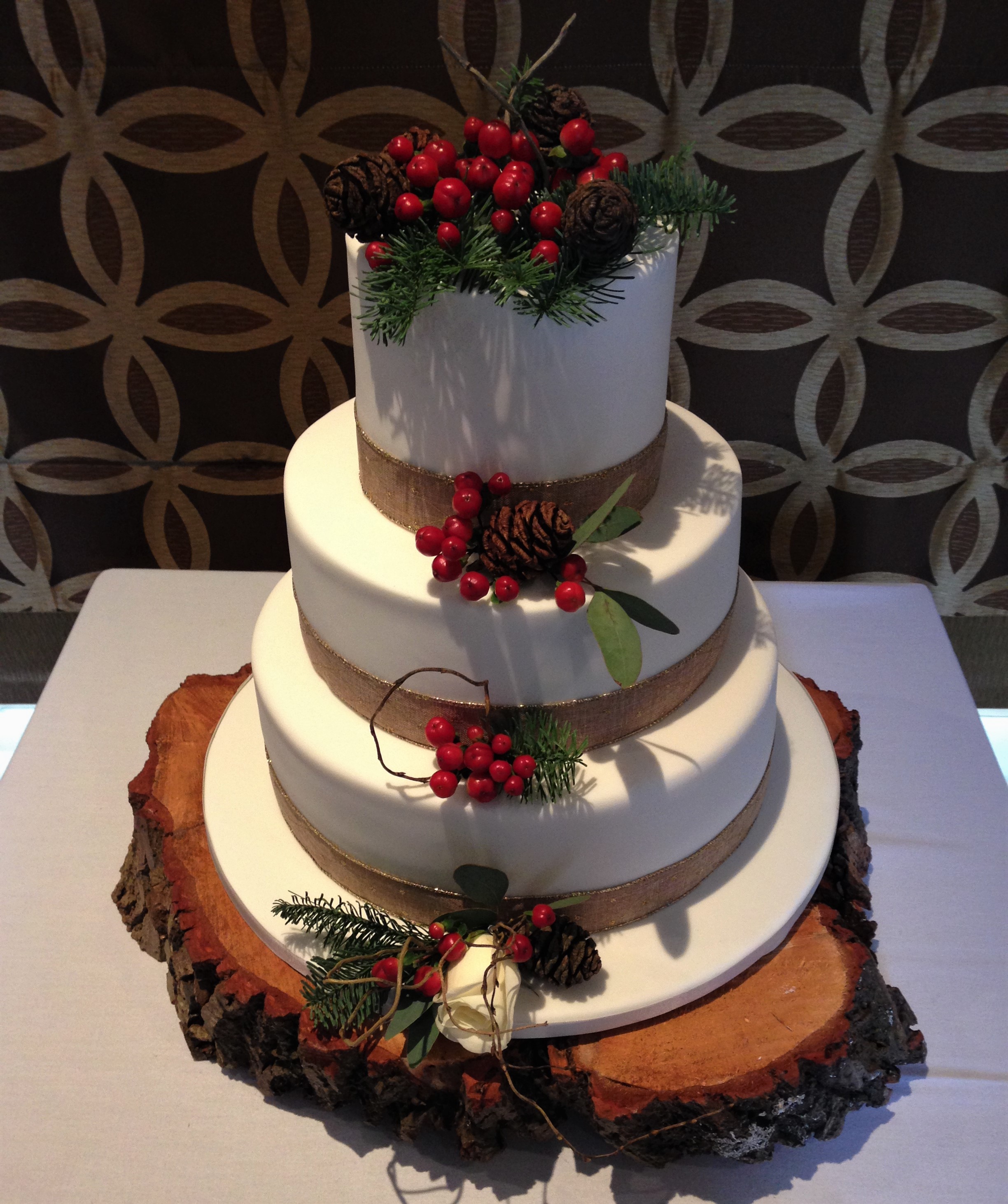 cake flowers and wooden log base for hire for a rustic feel