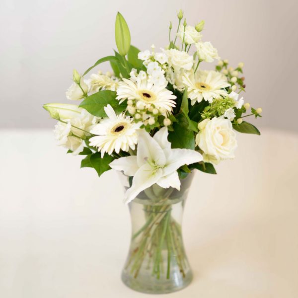 soft elegant display of roses and lilys