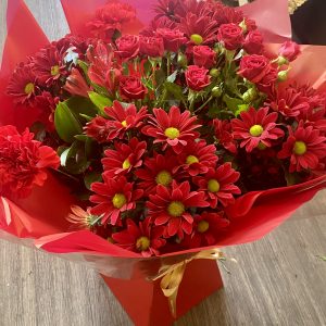 Christmas bouquet Beautiful tones of red flowers