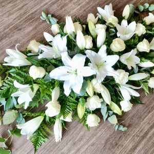 A charming double ended spray in any colour of your choice. Same day delivery. Due to seasonal variations some items may be substituted to produce a display of equal quality and value. Professionally arranged by our expert florists with care. Delivered by hand by our own driver. Click & collect is also available