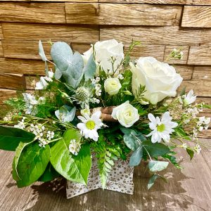 a selcetion of fresh christmas foliage and flowers perfect treat for someone special